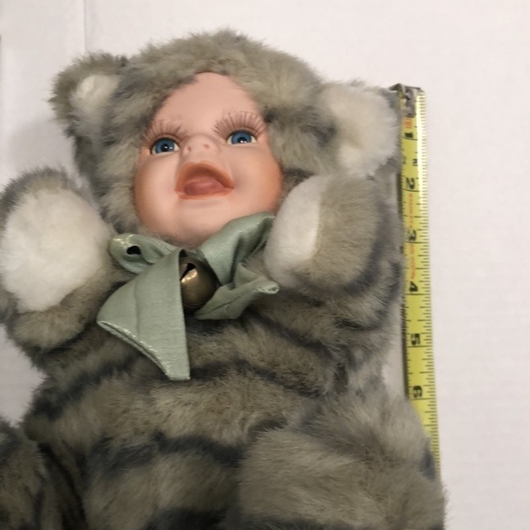 Geppeddo porcelain doll with a cat outfit that is striped and sage bow with bell - Picture 5 of 8